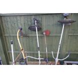 Collection of six petrol strimmers