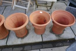 Three sets of 2 terracotta garden pots and a rectangular stone effect trough