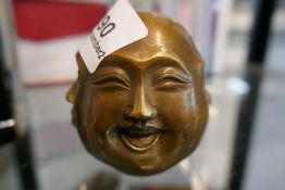 Four faced buddha head(s)