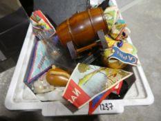 Box of collectables including miniature barrel, bunting, glass feeding bottle, mop spoons etc