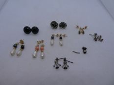 Collection of mixed 9ct and yellow metal earrings, set with pearls, coral etc