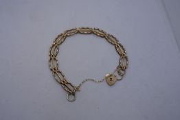 9ct unusual 3 bar gate link bracelet, with heart shaped clasp and safety chain, marked 375, 9.3g app