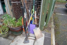 Collection of garden tools, saws, spade etc