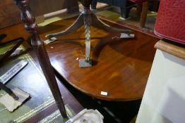 A reproduction Yew wood dining room suite containing an extending table, a set of eight chairs and a