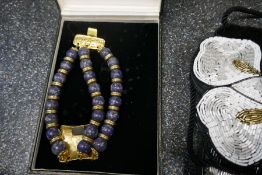 Boxed Swarovski necklace, boxed Monet examples and 2 beadwork handbags