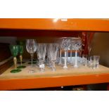 Various cut glass drinking glasses including champagne and wine