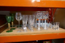 Various cut glass drinking glasses including champagne and wine