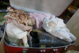 A suitcase of modern dolls