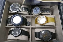 Collection of boxed and unboxed men's wristwatches, including Seiko, Swatch etc