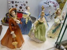 A quantity of Doulton figures including Grand Manner