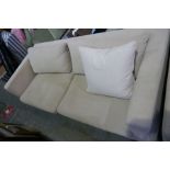 A pair of modern settees having beige upholstery