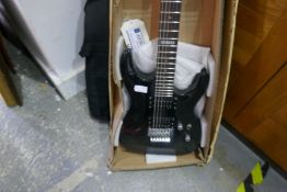An ESP Ltd MH50 Electric guitar and a Hohner accoustic guitar