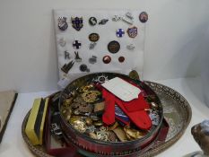 A quantity of military badges and buttons, and other sundry items