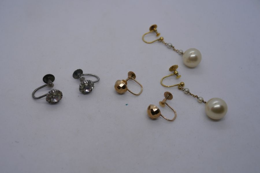 Two pairs of 9ct screw back earrings and a silver pair