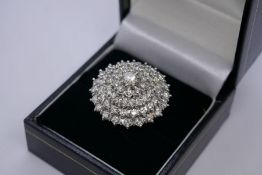 Large impressive diamond cluster ring comprising approx. 71 centre diamonds approx. 0.4 carat and 70