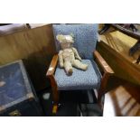 An old teddy and a Childs rocking chair