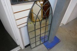 Tall arched outdoor mirror