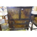 A mahogany two tier table, the top inlaid star and a reproduction cupboard having two drawers