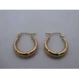 Pair of 9ct yellow gold creole earrings marked 375. approx .7g