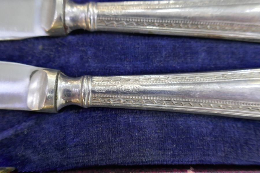 A set of six silver handled knives, cased Yates Brothers, Sheffield 1927, and various silver spoons - Image 3 of 7