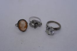 Silver cameo ring and two other white metal dress rings