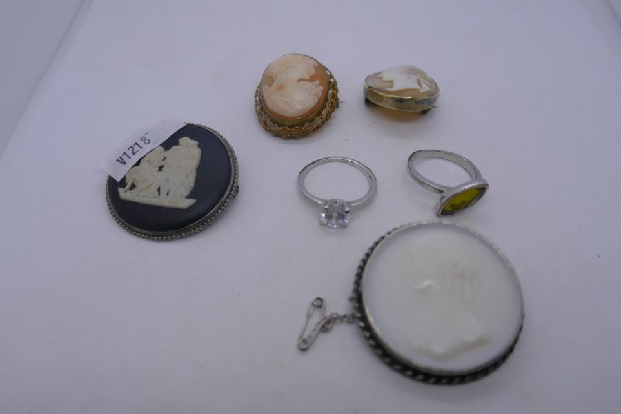 Collection of cameos and two silver rings, one a black jasperware Wedgwood example