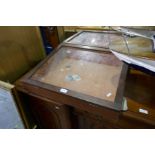 A mahogany table top display case