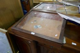 A mahogany table top display case