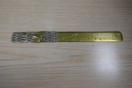 Decorative brass letter opener decorated with dragonflies