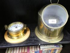 A Sestral binnacle compass and a modern ship style clock