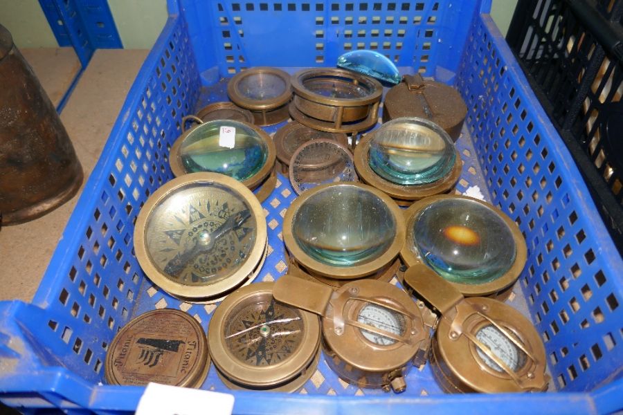 Tray of modern compasses and magnifying glasses (AF)