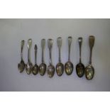 Nine silver teaspoons of various designs and hallmarks, some with slight ware to the hallmarks. Tota