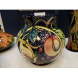 Moorcroft, a Queens choice pattern vase decorated figs and peaches, 14.5cm