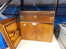 Table top cabinet with concealed draws and patterned top, antique writing box and two wooden picture