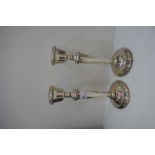 A pair of silver large candlesticks with beaded rim. Hallmarked Birmingham 1972 S J Rose and Son. 24