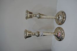 A pair of silver large candlesticks with beaded rim. Hallmarked Birmingham 1972 S J Rose and Son. 24