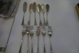 A set of six silver Victorian fish knives and forks of decorative pierced design. Hallmarked London