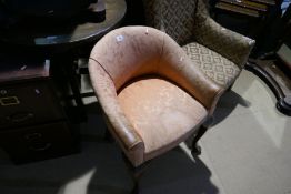 Two antique bedroom chairs, one a low wing back example, the other a tub chair