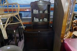 Inlaid mahogany sideboard with drawers above cups and similar open bookcase