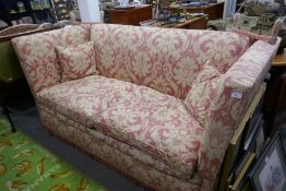 A modern Knoll settee having floral upholstery