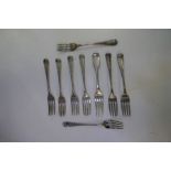 Eight Georgian silver London forks, three 1801 I B, one pair 1833 William Theobalds, one pair 1825 W