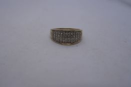 9ct contemporary band ring set with 4 rows of diamond chips, size Q, approx 3g, marked 375