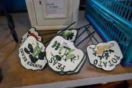 6 x cast iron vegetable signs