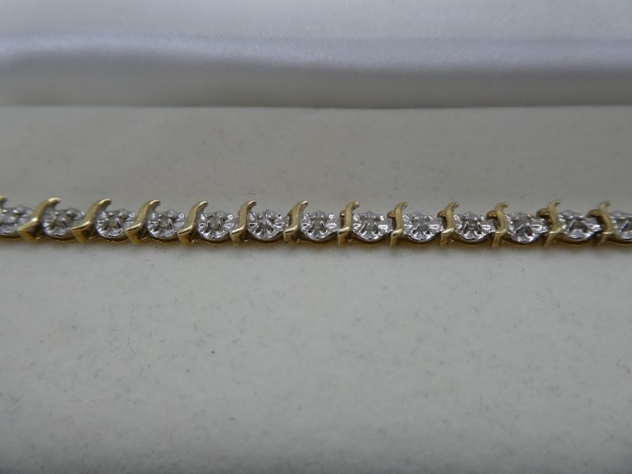 Pretty boxed 10K yellow and white illusion diamond set tennis bracelet, approx 19cm, 10K marked with - Image 2 of 6