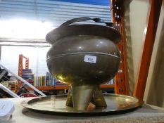 Large copper pot with a brass plate