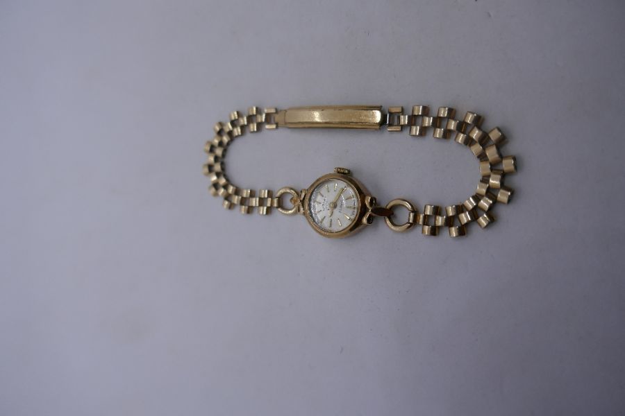 Vintage 9ct yellow gold Rotary watch, case marked 375, on a yellow metal strap and rolled gold clasp