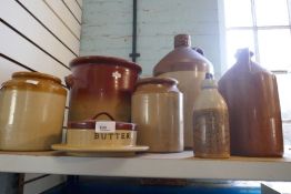 Selection of glazed stoneware including flagons, butter dish, ginger beer bottles, etc