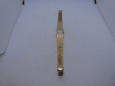 9ct yellow gold ladies 'Longines' cocktail watch, marked 375 with square dial and champagne face, 33