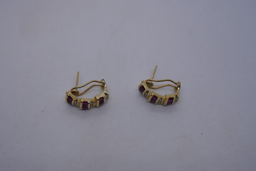 Pair of modern 14K yellow gold scalloped design stud earrings set with baguette cut rubies, separate - Image 3 of 8