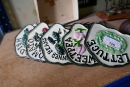 Six salad cast iron signs